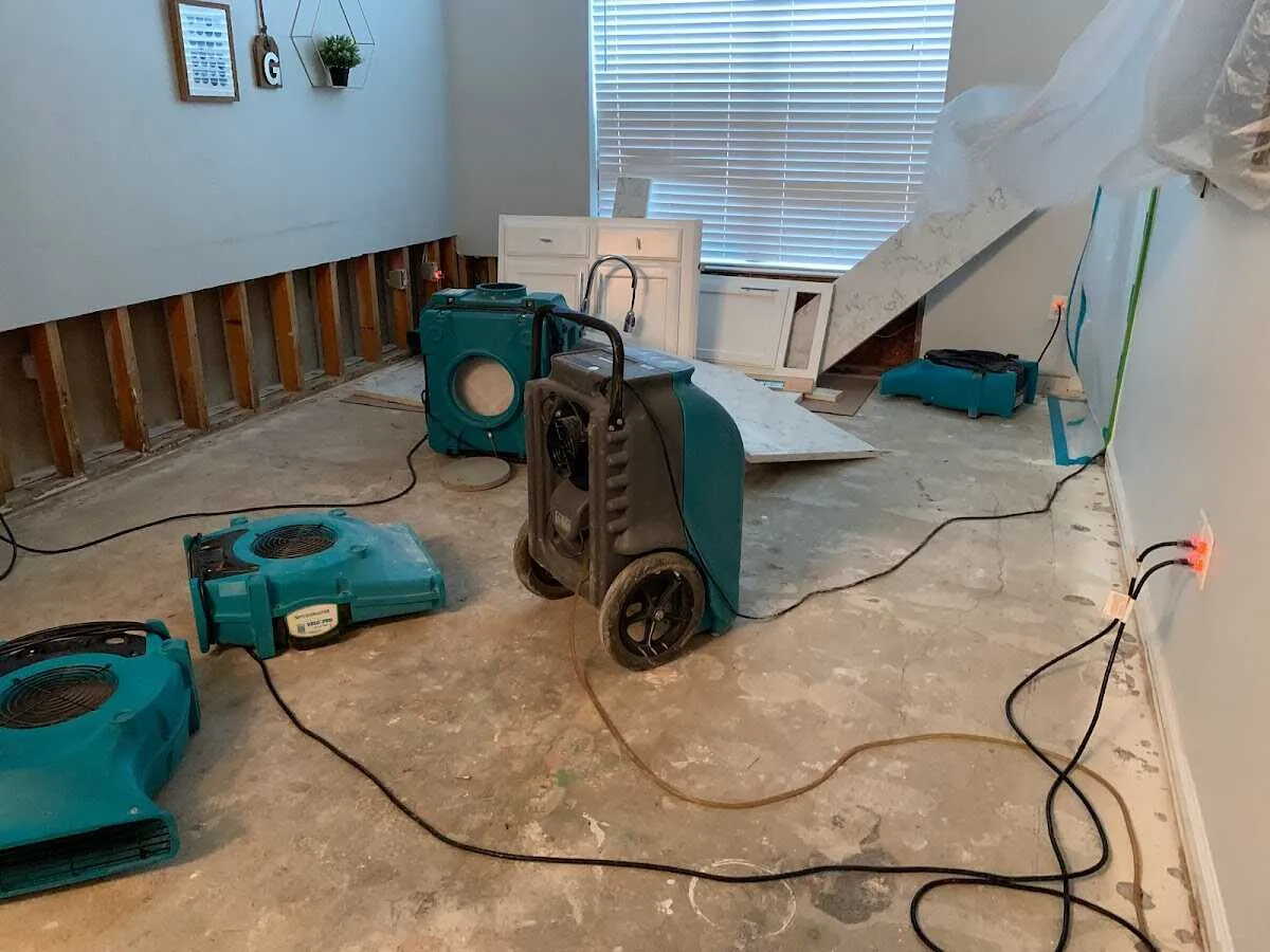 Dehumidifier in flood-cut room for Water Damage Restoration in Dos Palos